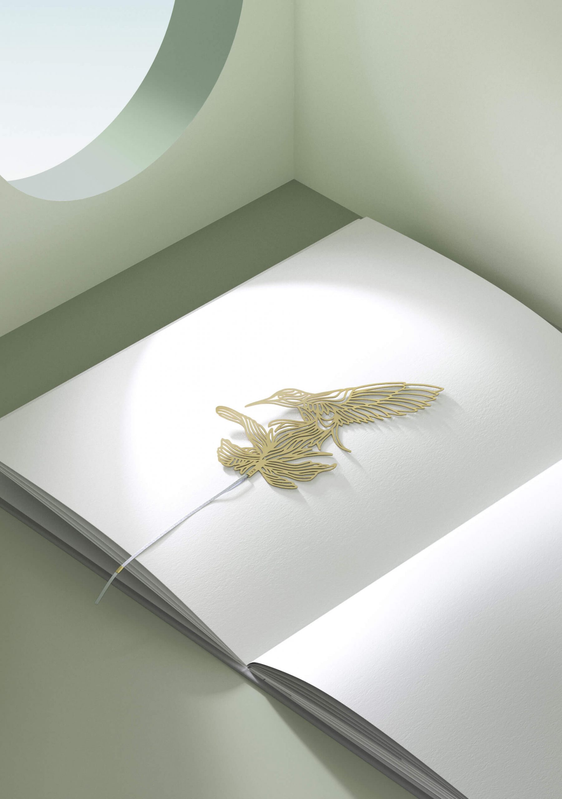 Laser-cut detailed bookmark laying on an open book in a softly lit ambiance.